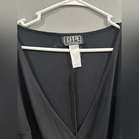 COPY - CITY
TRIANGLES
Black gathered wrap dress size M - Picture 4 of 4